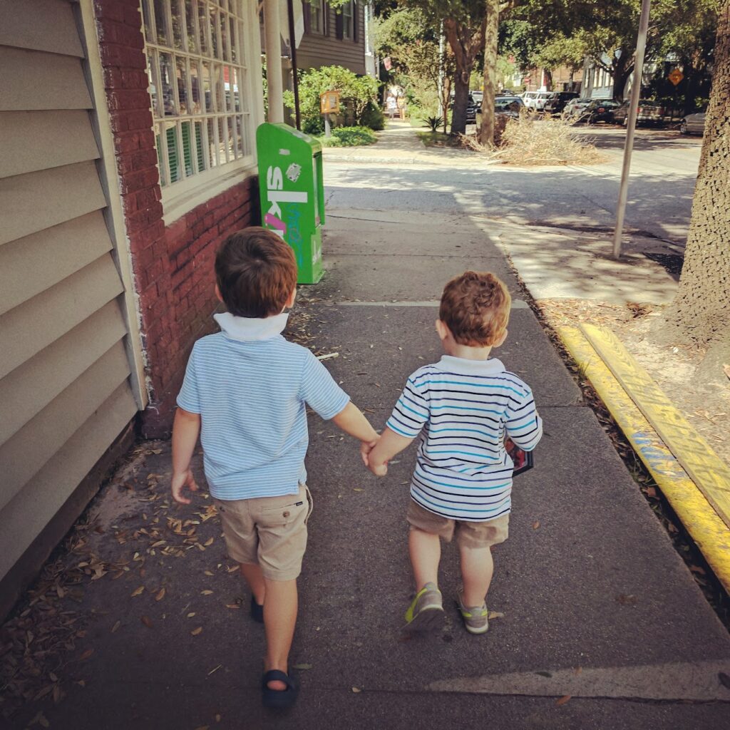 boys walking down street